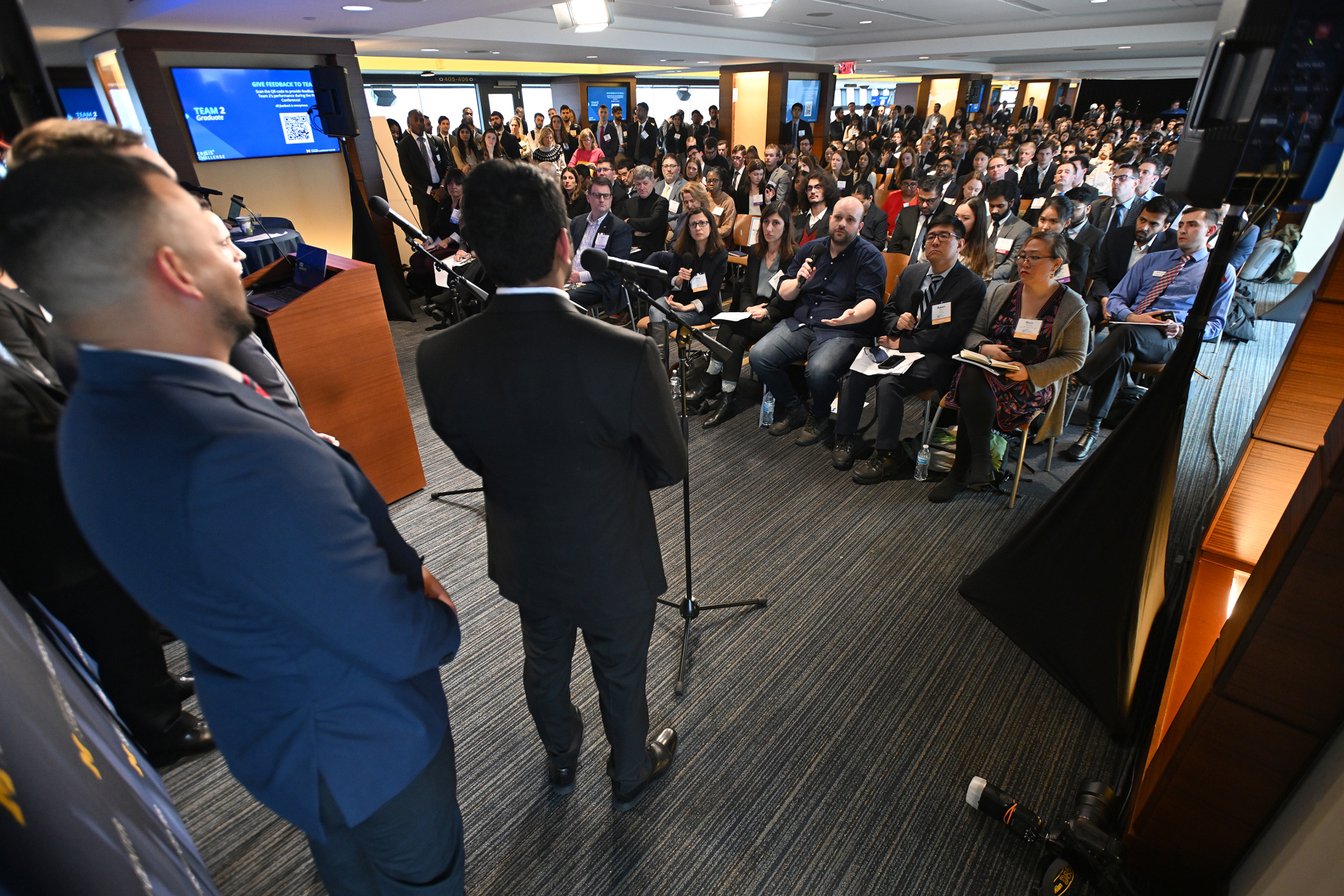 Students speak to a large crowd of media and leaders.