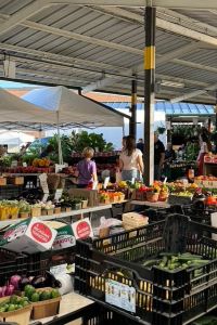 Photo of Kerrytown Farmer's Market with lots of fresh produce. 