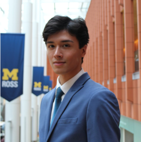 A man in a blue business suit