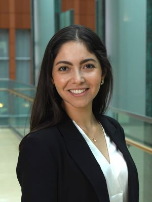 Woman in a blazer in the Ross building