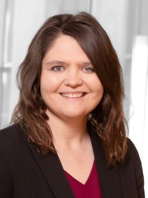 Carrie Albers smiling in a headshot photo