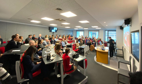 Attendees listening to Professor Jeffrey Sanchez-Burks at a conference