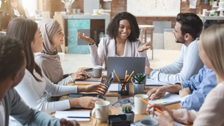 group of working professionals having a meeting