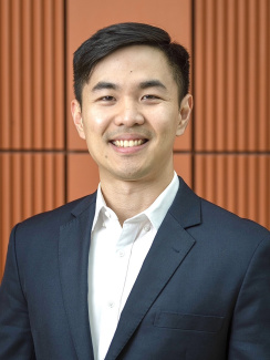 A headshot of Napat in the Ross building.