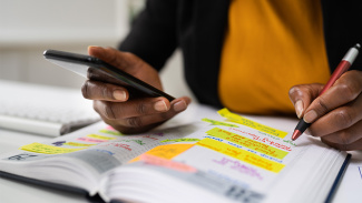 Woman planning schedule in calendar