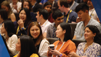 A crowd of new MBA students