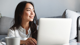 Woman smiles while working from home