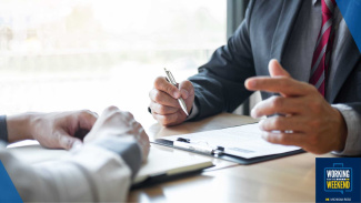 two people sitting at an interview