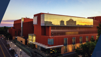 An aerial shot of the Michigan Ross building at sunset.