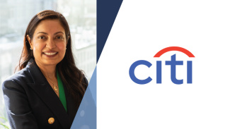 A woman in a black blazer and green shirt smiles and crosses her arms. To her right is the Citi logo