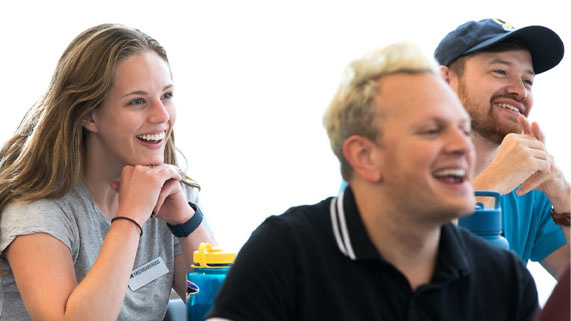 OMBA welcome weekend - students in classroom smiling